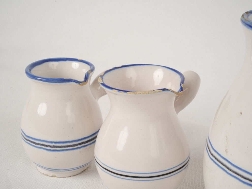 Antique Martres-Tolosane milk jug trio