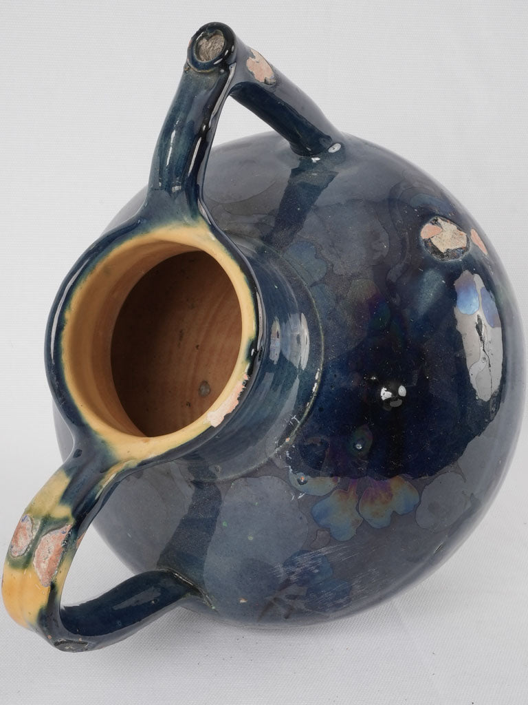 Aged blue-yellow contrast pottery jug