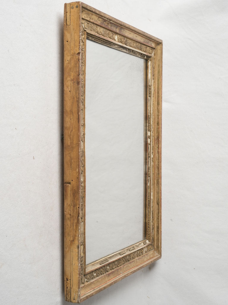 Rectangular gold-accented wall mirror