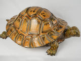 Charming weathered garden tortoise sculpture