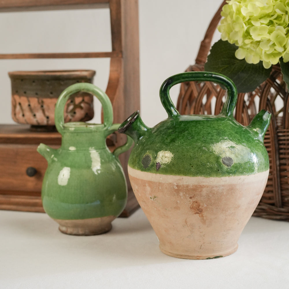 Rustic green-glazed vintage water pitcher