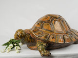 Aged ceramic tortoise garden centerpiece