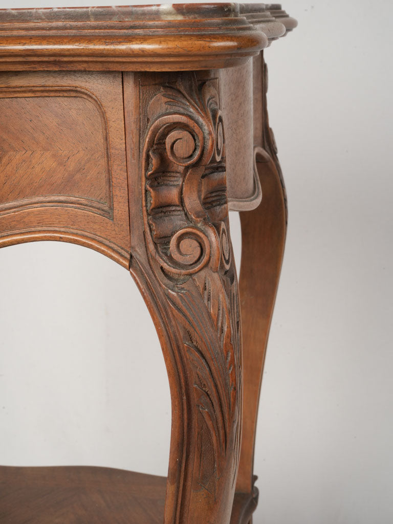 Delicate scroll motif marble top furniture piece