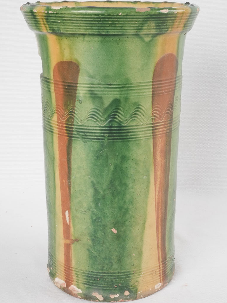 Time-worn green French ceramic urn