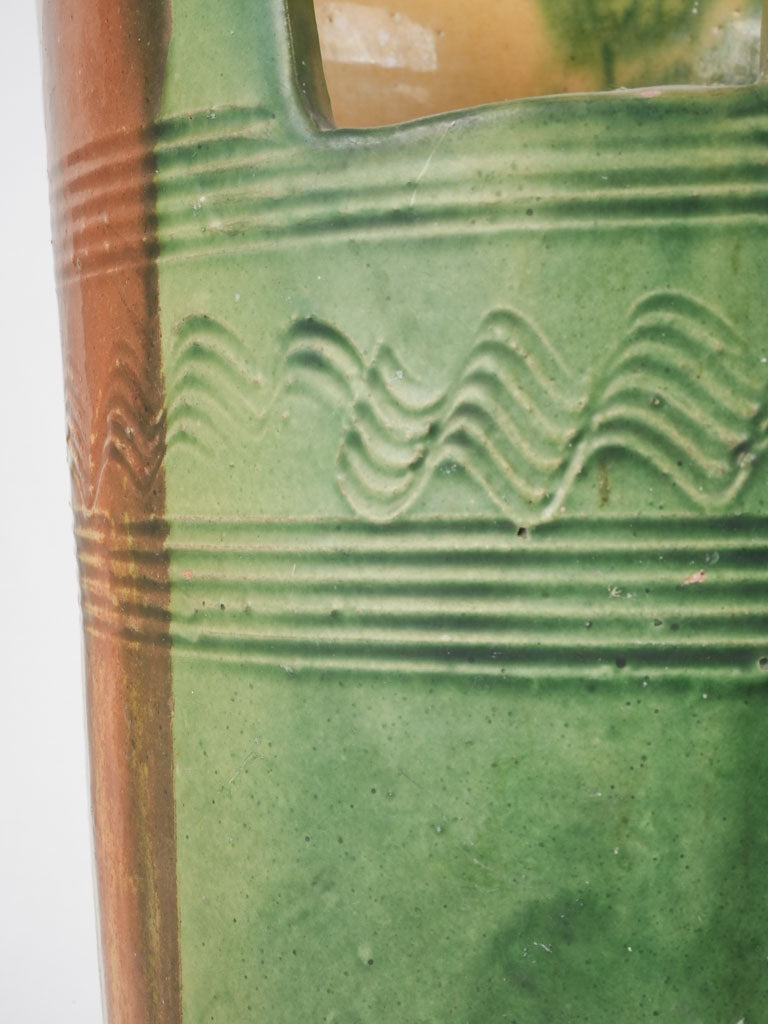 Early-century French green glazed urn