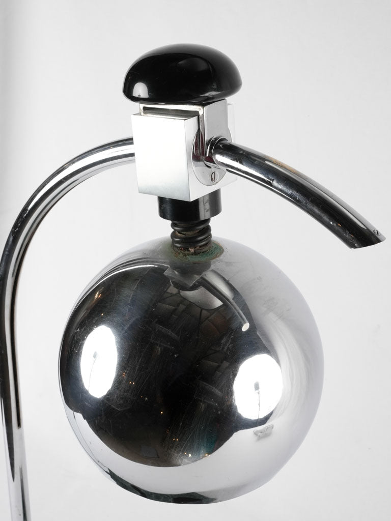 Refined chrome-handle adjustable table lamp