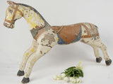 Aged and worn wooden carousel horse