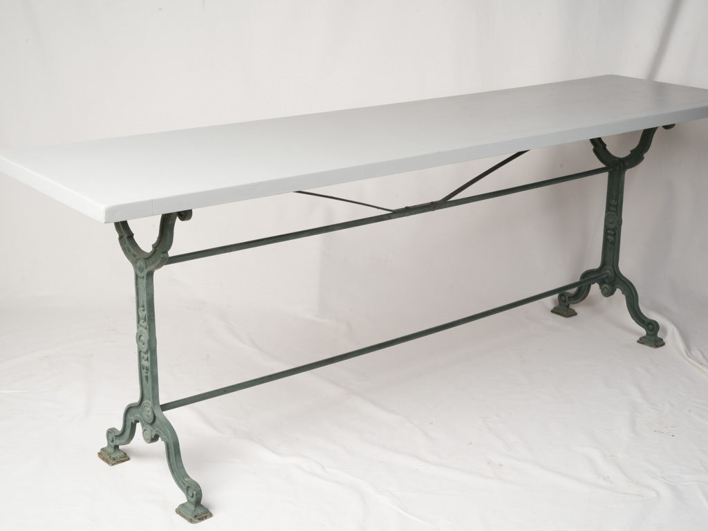 Sleek Grey Top Cast Iron Table