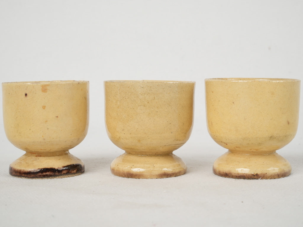 Elegant Dieulefit yellow faience egg cups