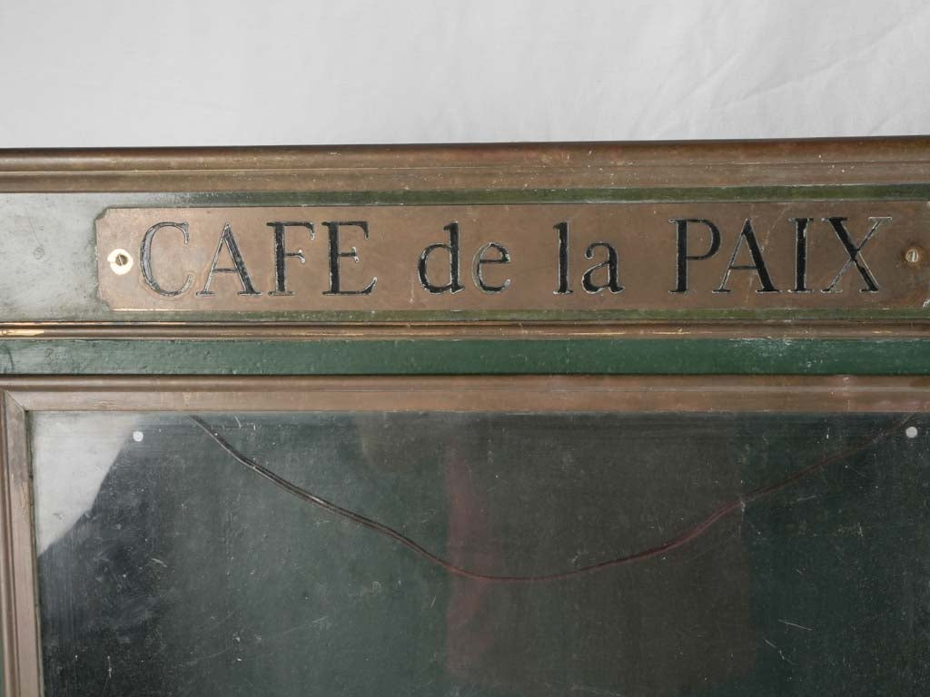 Classic early-20th-century café billboard