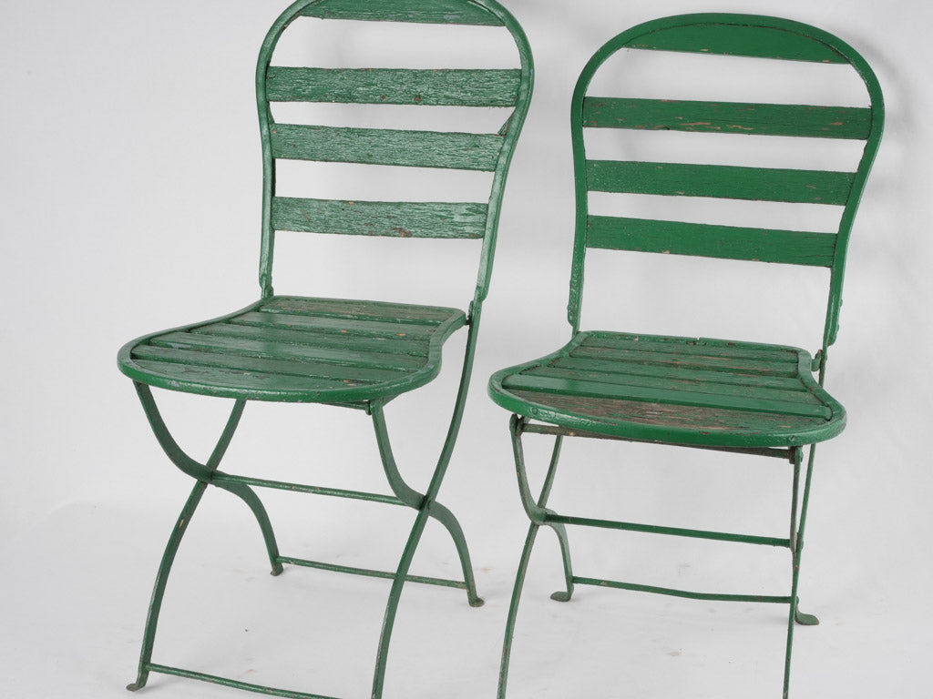 Distressed green antique garden chairs