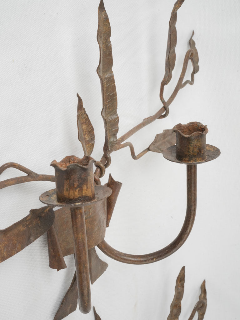 Artisanal wrought iron sconces