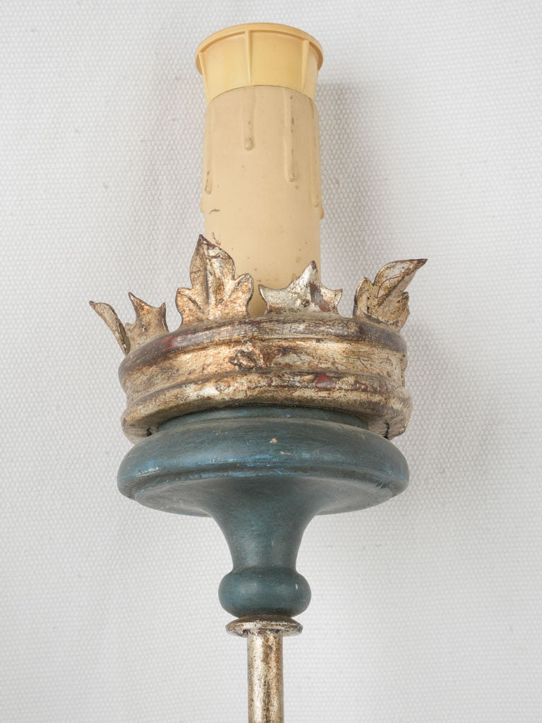 Dramatic crown motif wall lights