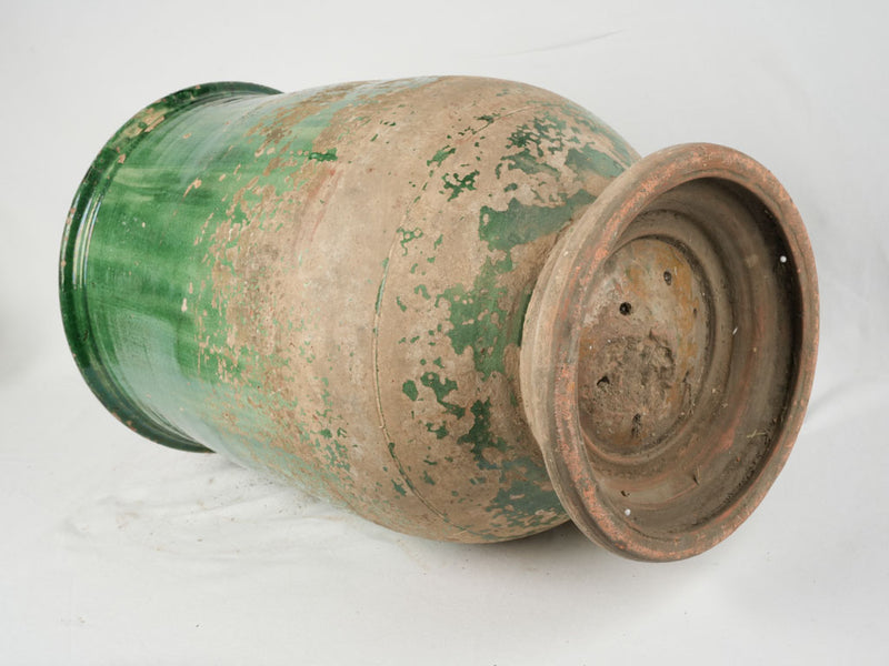 Classic dark green glazed pottery jar