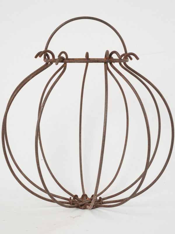 Aged wrought iron sphere planter