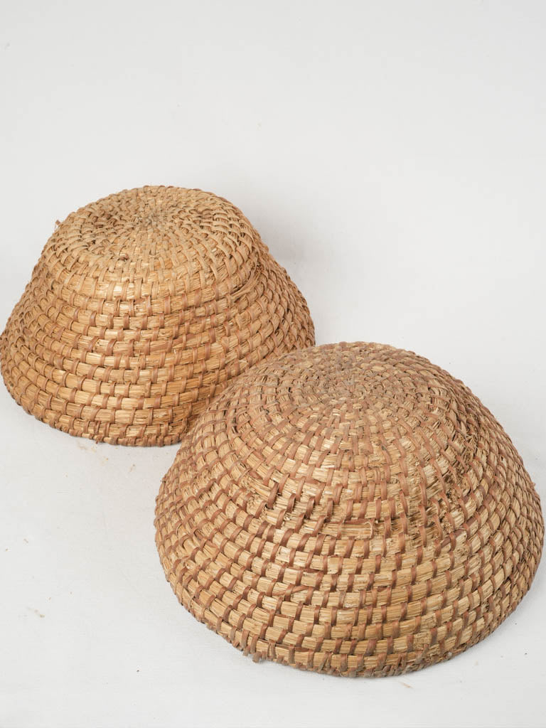 Aged French rustic woven boulanger's bowls