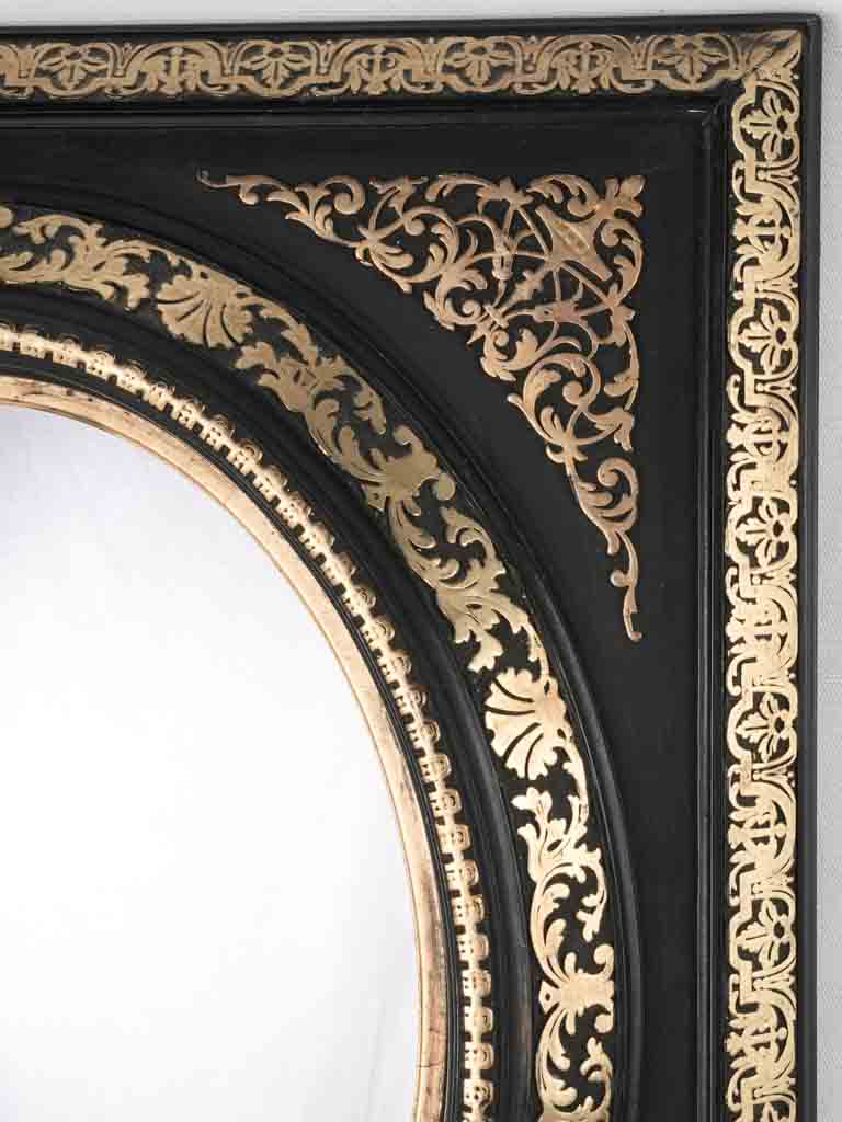 Black & gold Napoleon III mirror - oval medallion 21¾" x 22"