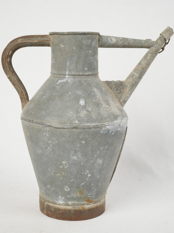 Aged rustic French indoor watering can
