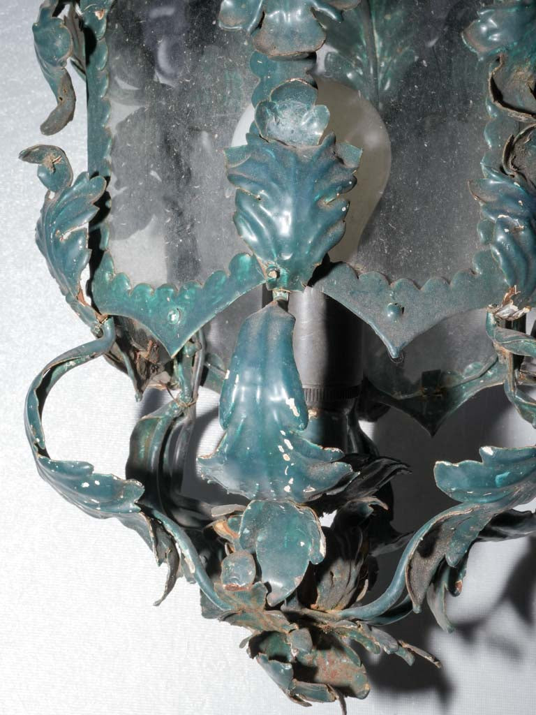 Dark teal flower-adorned lantern