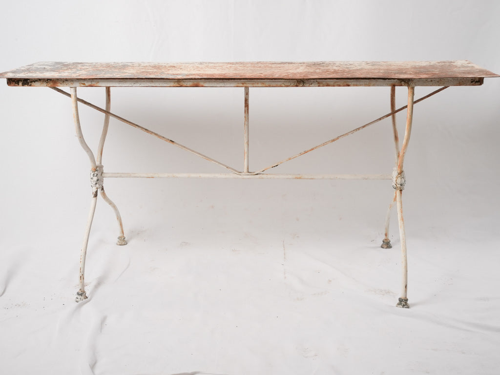 Vintage iron rosette motif table