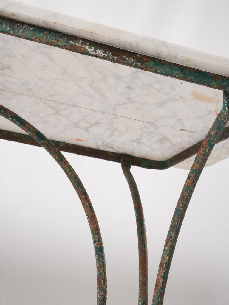 Time-worn outdoor neoclassical-style table