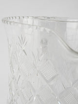 Opulent glass pitcher with ice chamber