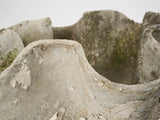 Weathered, flower-shaped outdoor pots