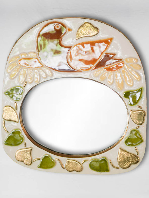 Vintage arched ceramic mirror