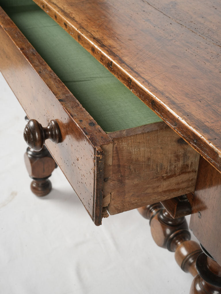 Intricately carved walnut table