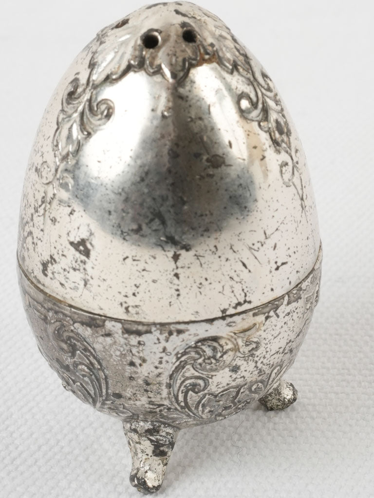 Aged embossed egg-shaped salt shaker