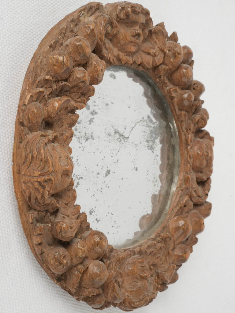 Aged, elegant, round, French, cherub mirror