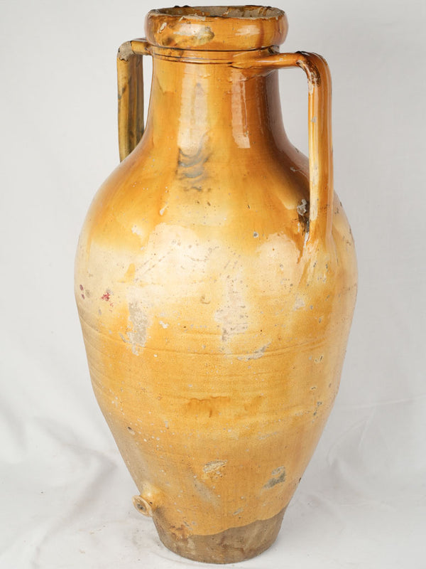 Antique yellow ocher glazed amphora