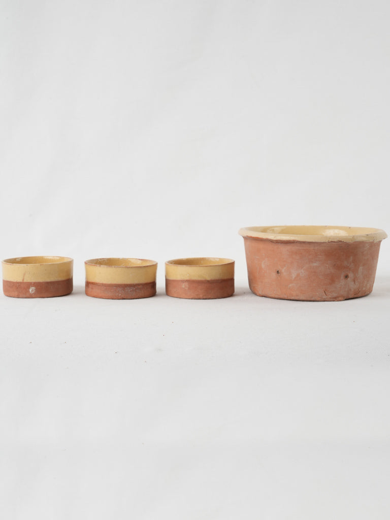 Aged ocher glazed faisselle molds