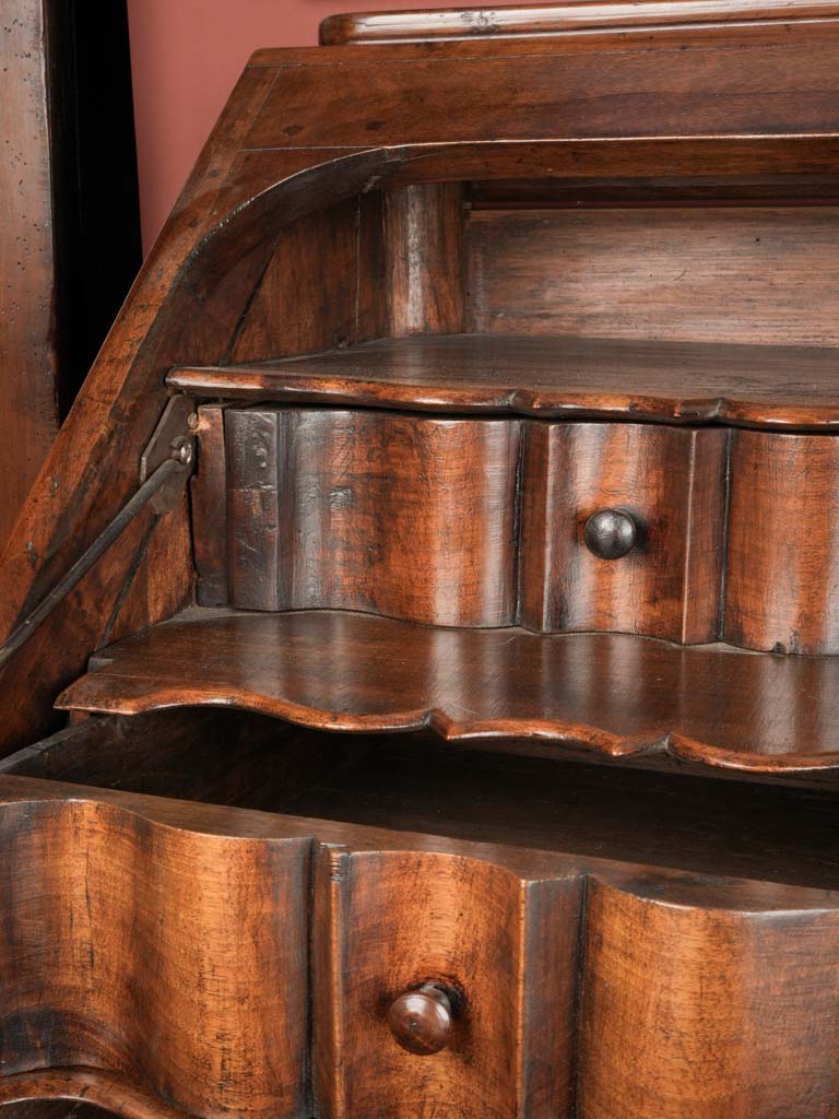 Opulent carved double walnut secretaire