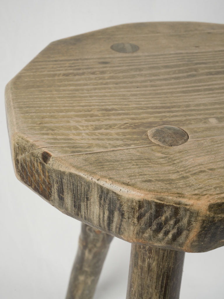 Worn wooden pedestal sculpture seat