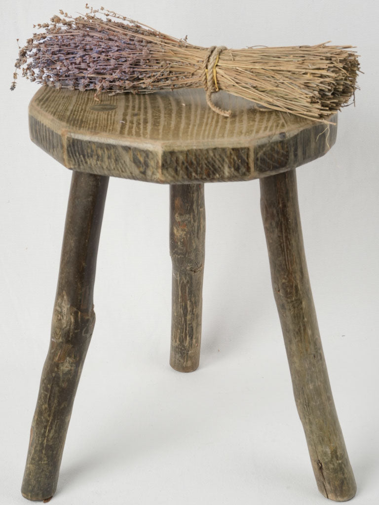 Primitive 1950s three-legged stool