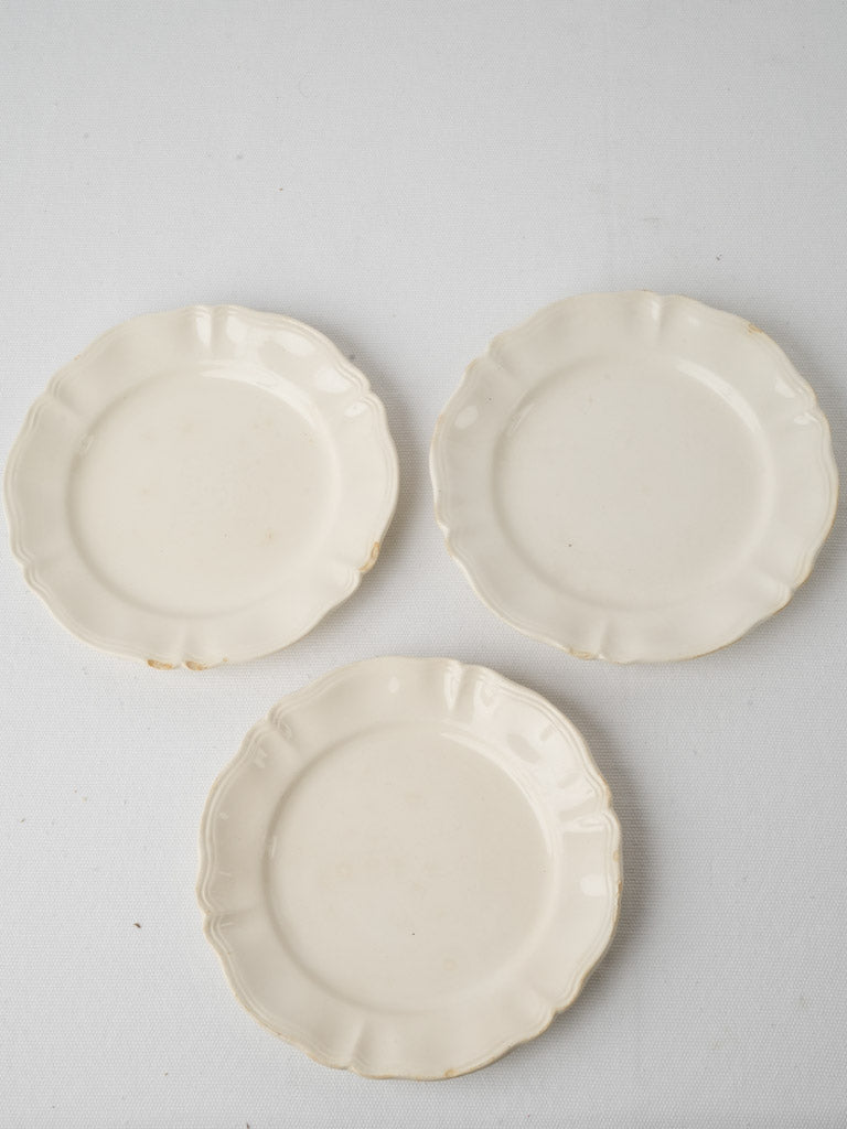 Delicate off-white ceramic side plates