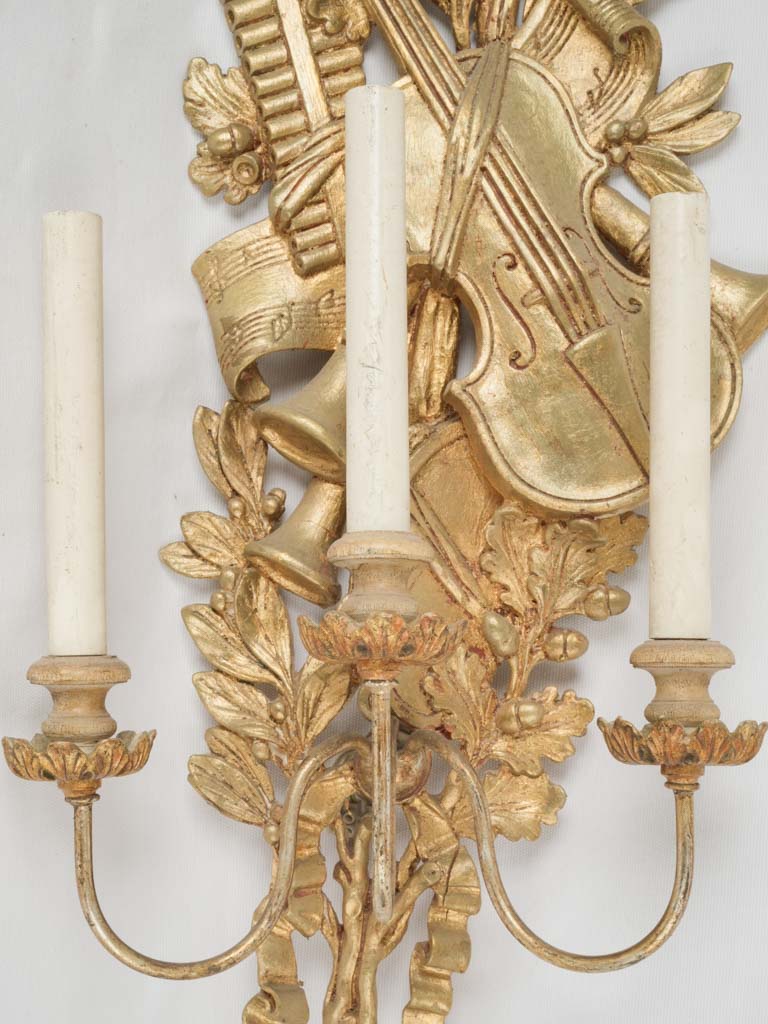 Lavish vintage three-light wall sconce