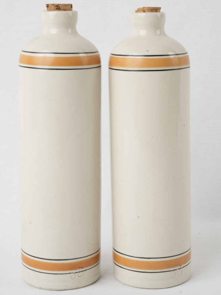 Aged white and orange ceramic bottles