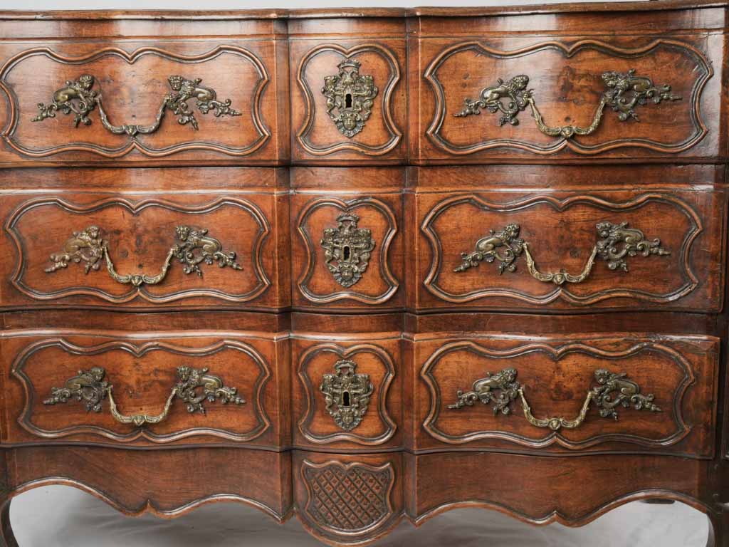 Aged Louis XV period lion hardware chest