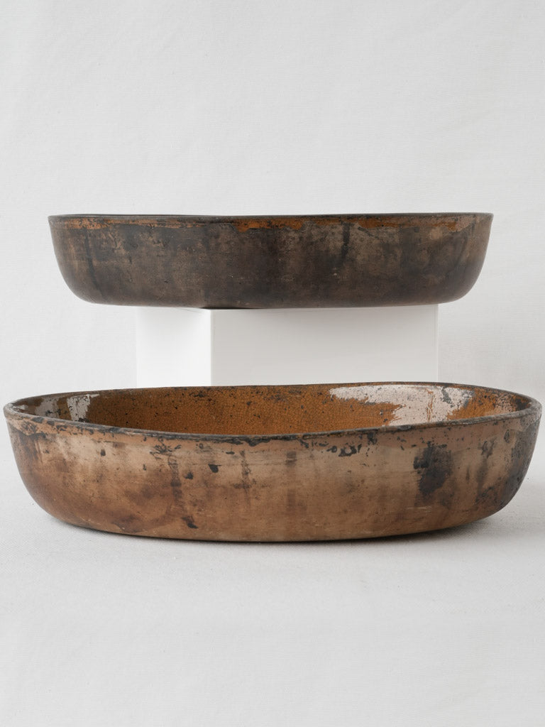 Charming aged French oval gratin dishes