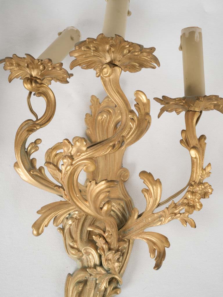 Ornate acanthus-leaf design sconces