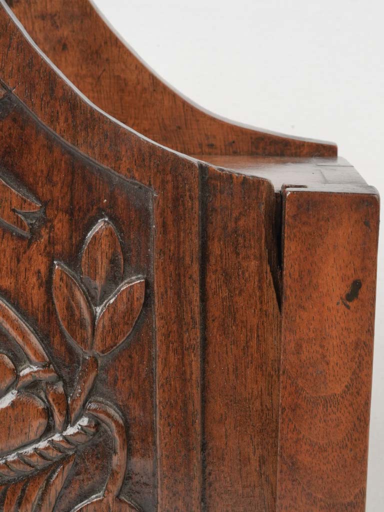 Decorative carved walnut storage bin  