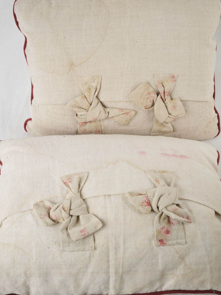 Aged red-trimmed floral pillow set