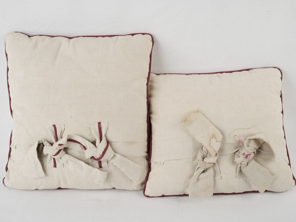 Aged red-trimmed cherry cushions