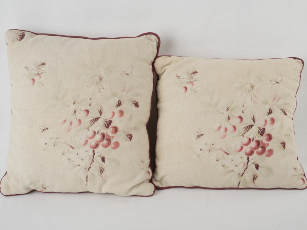 Vintage-style cherry and floral pillows