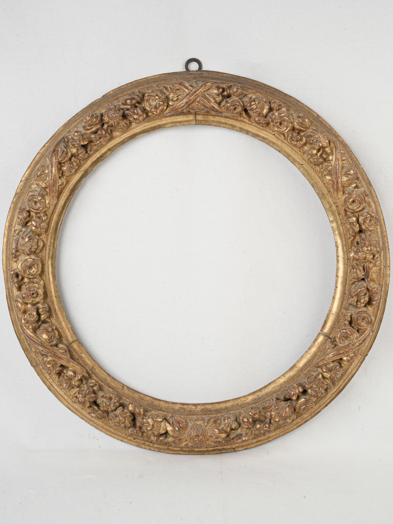 Exquisite antique giltwood tondo frame