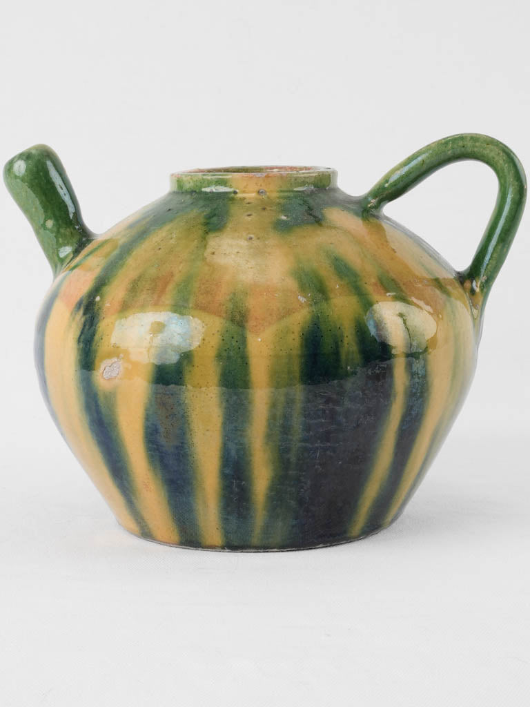 Old-world charm green ceramic pitcher