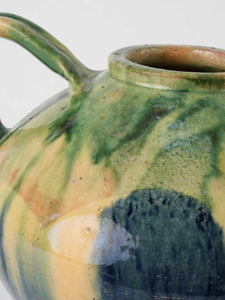 Earthenware yellow-accented French water pitcher