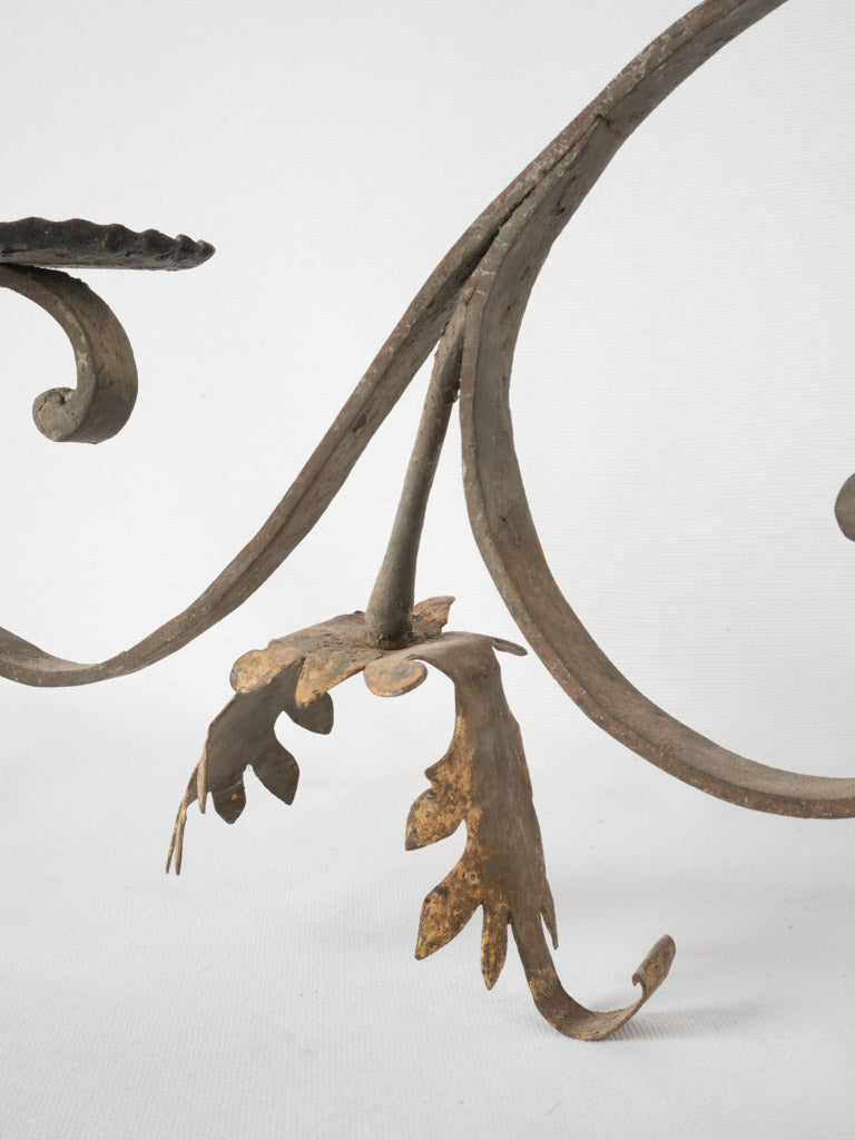 Decorative wrought iron wall fixture